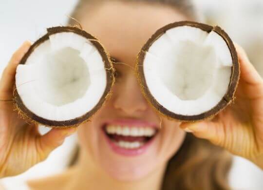People-Mid-Aged-Woman-Having-Fun-With-Coconuts-Medium