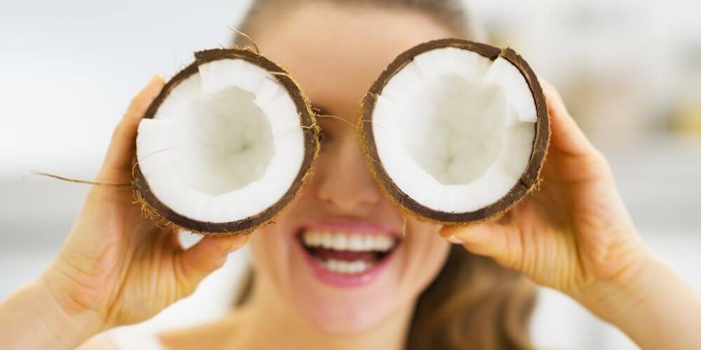People-Mid-Aged-Woman-Having-Fun-With-Coconuts-Medium